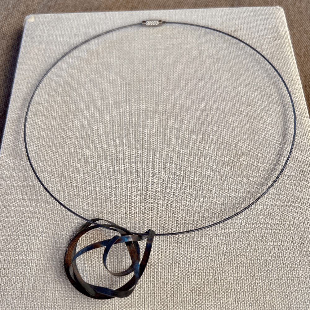 Madera Design Studio hosts guest artist Lit Clue. Handmade Metal Jewelry crafted from Steel, brass and iron. All one of a kind unique.