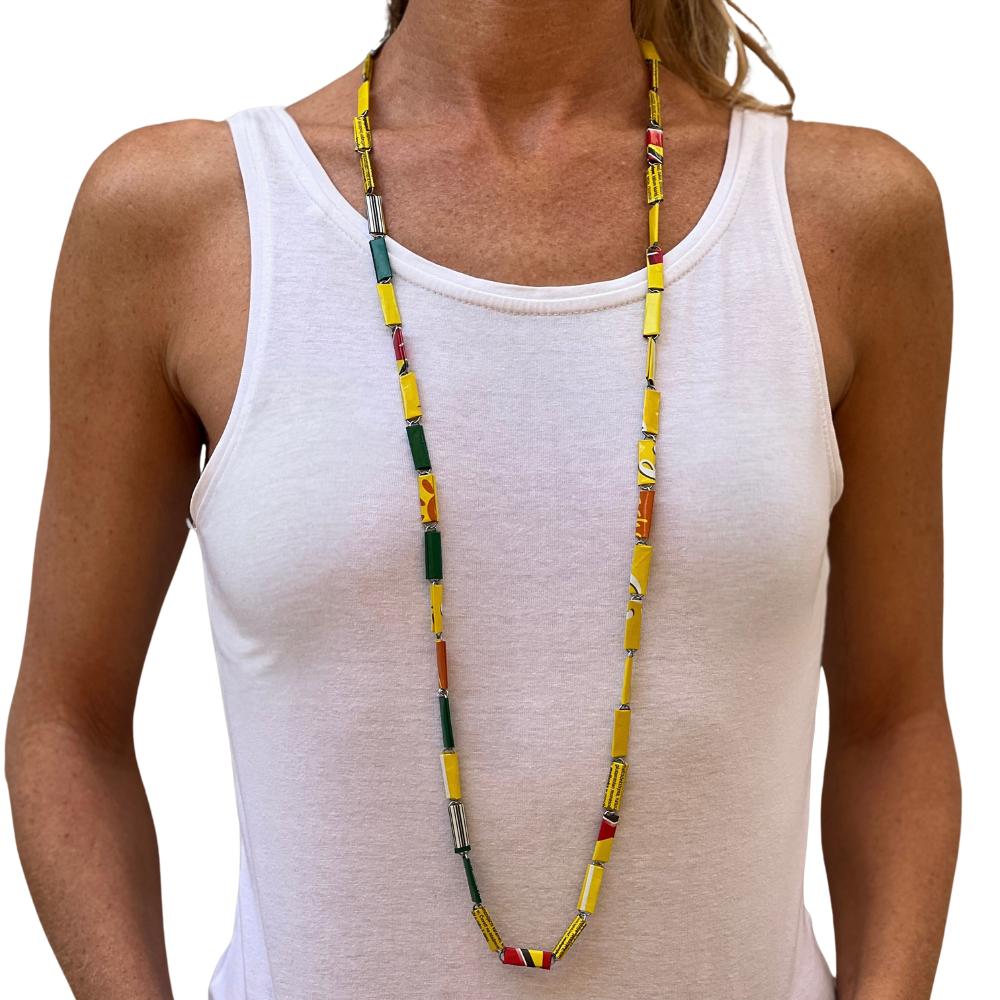 Yellow and green upcycled candy wrapper necklace - long on model