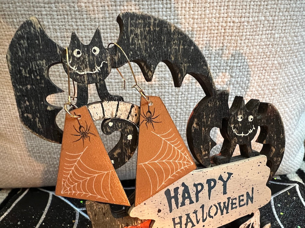 Madera Design Studio - Orange spider web pattern dangle earrings. Happy Halloween!
