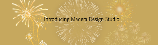 Introducing Madera Design Studio - handcrafted wooden jewelry- gold background with gold fireworks 