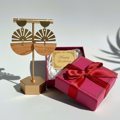 Up-cycled 1/2 circle olive wood and 1/2 Brass circle sun ray findings.  Statement earrings by Madera Design Studio