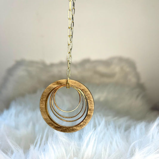 Circle Necklace on Fur background by Madera Design Studio