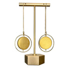 Gold hand painted wood bead threader earring on a gold stand