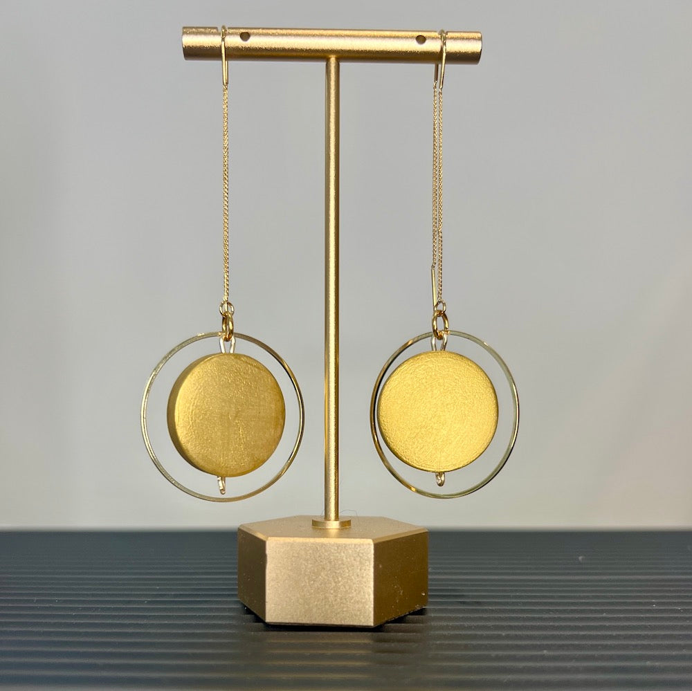 Gold hand painted wood bead threader earring on a gold stand