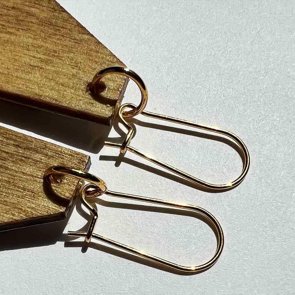 Snowflakes earrings CU of 18k gold plated findings by madera design studio