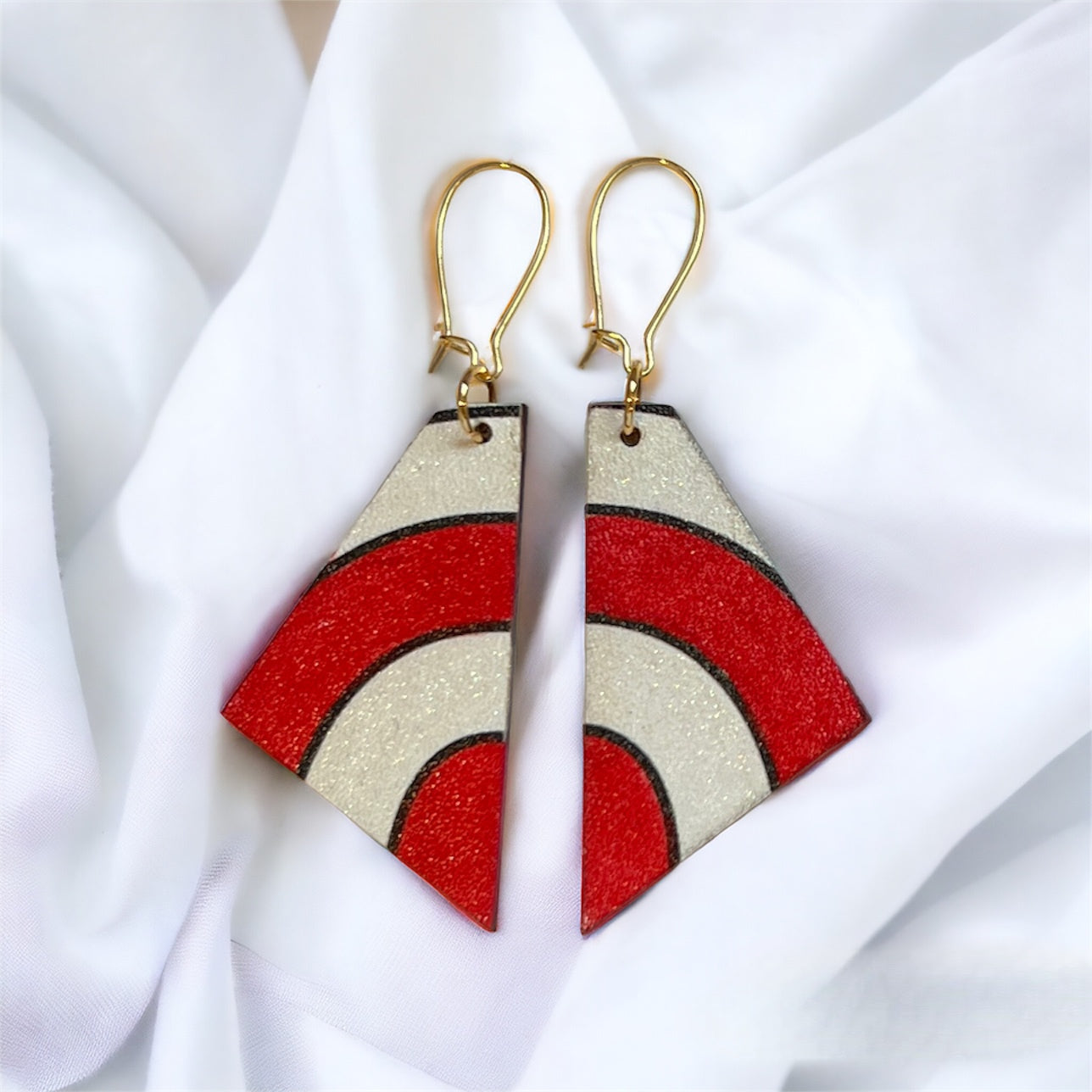 Red and white stripped earrings. Hand painted by Madera Design Studio