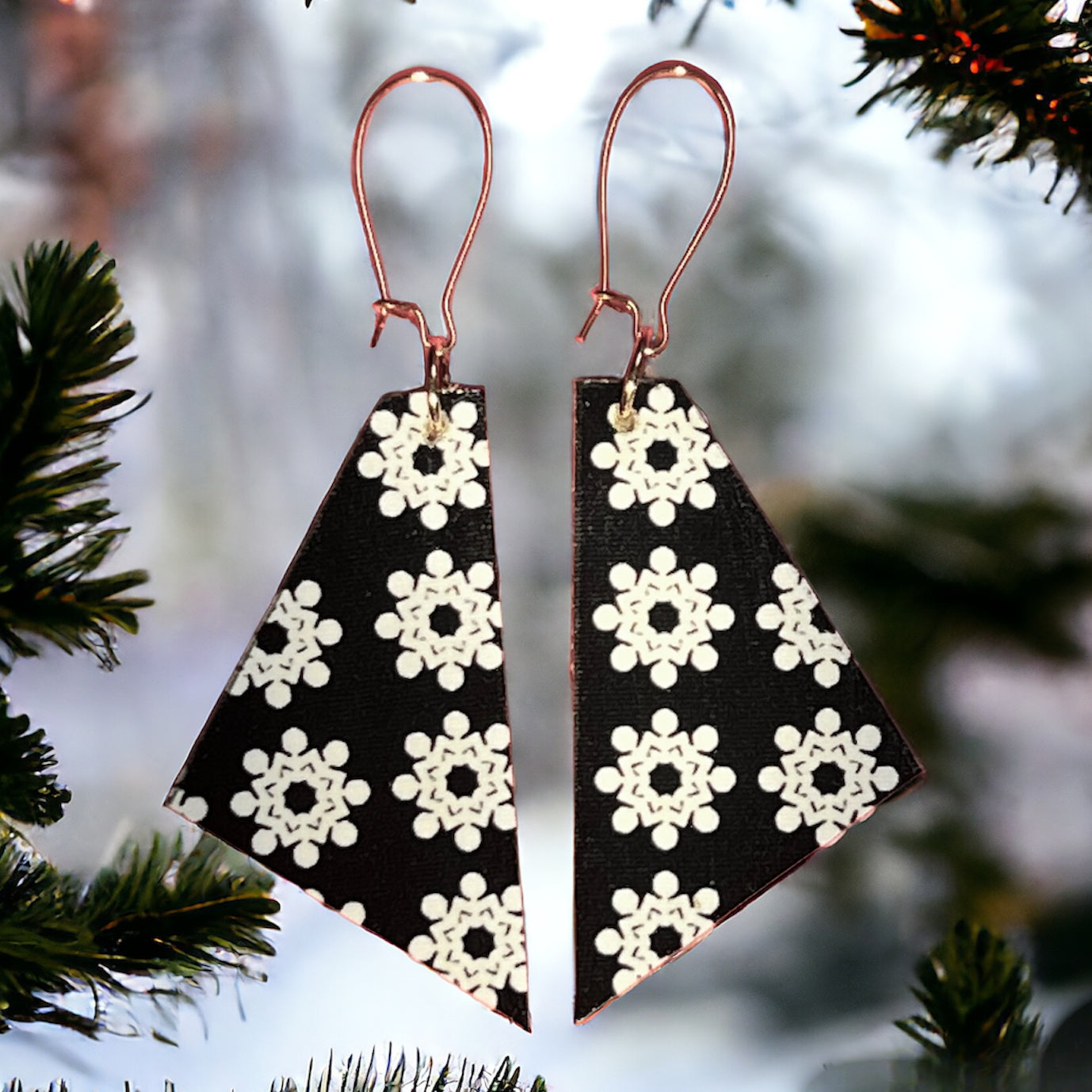 Snowflake Earrings. Black fabric with white snowflakes on wood. Madera Design Studio.