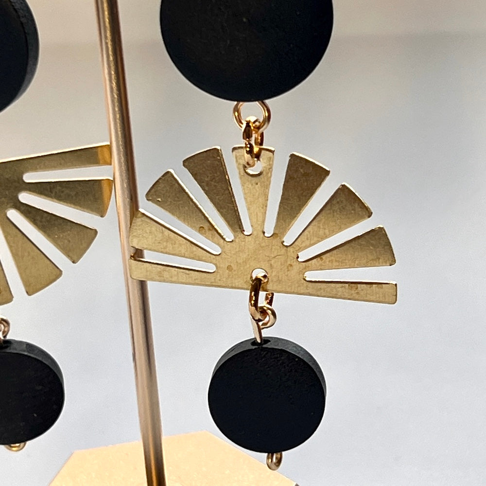 Solar eclipse earrings - black wood beads join with sunburst charms to create a dramatic dangle earring by Madera Design Studio - Close Up of Starburst