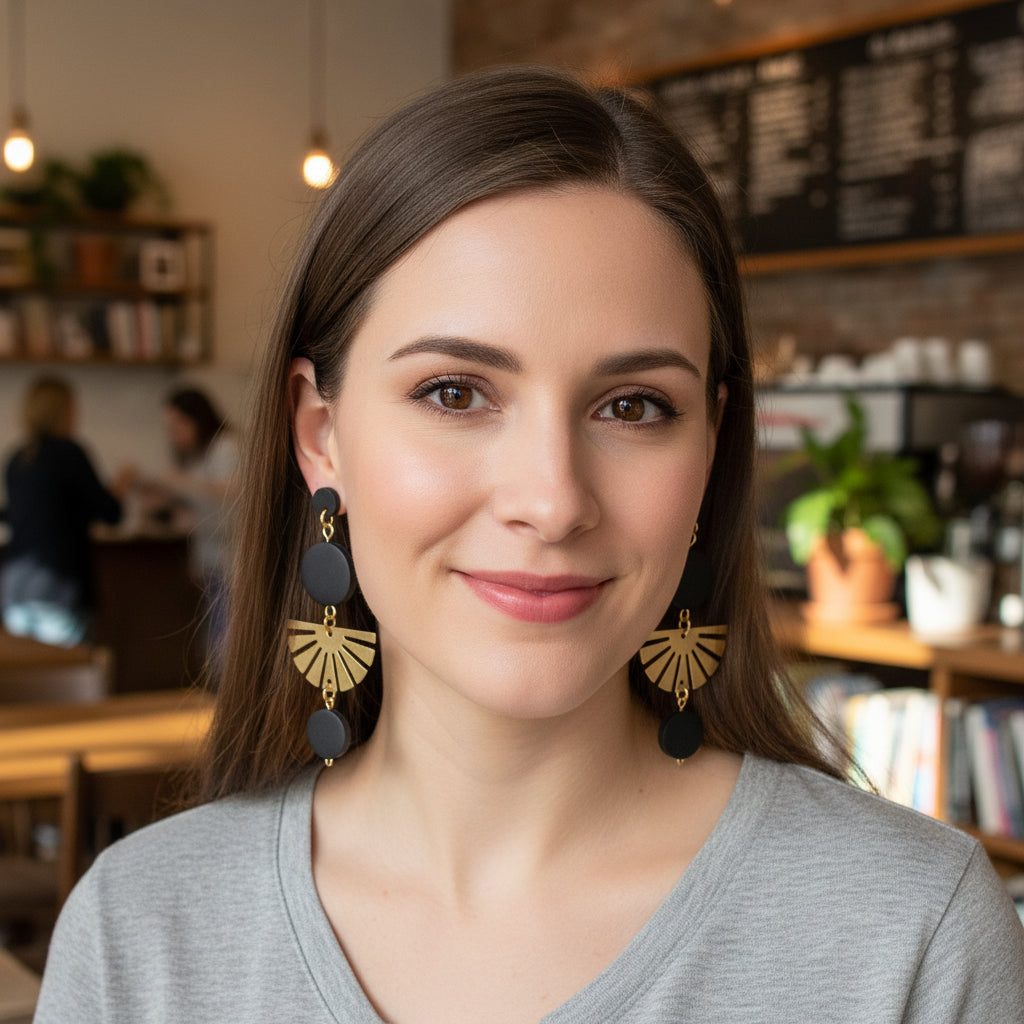 Solar eclipse earrings - black wood beads join with sunburst charms to create a dramatic dangle earring by Madera Design Studio 