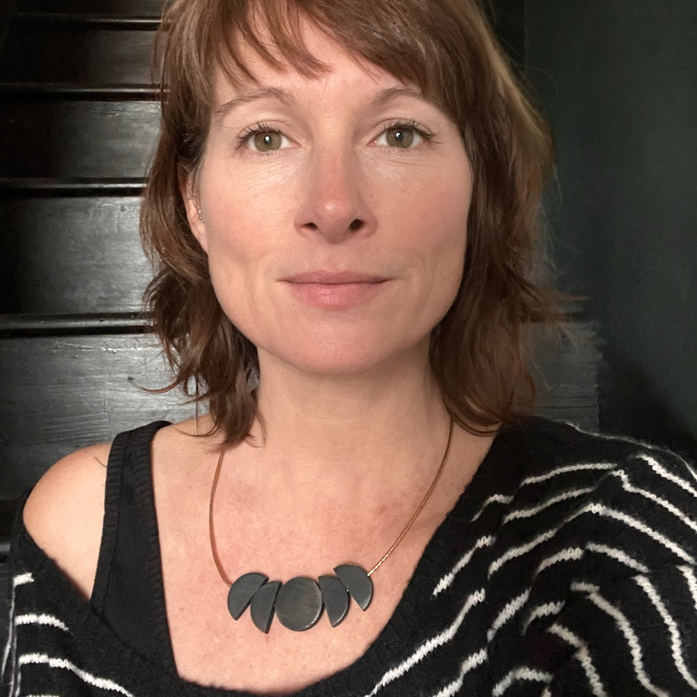 black bead moon necklace on Stacey Shevlin of Madera Design Studio
