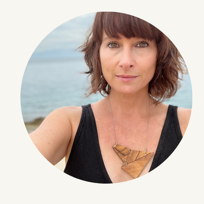 stacey shevlin of madera design studio at beach in croatia - photo links to about me page
