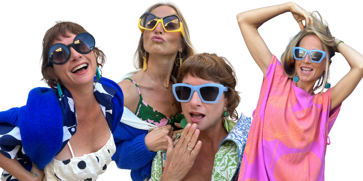 Four people wearing colorful sunglasses and Mad Era Earrings against a white background