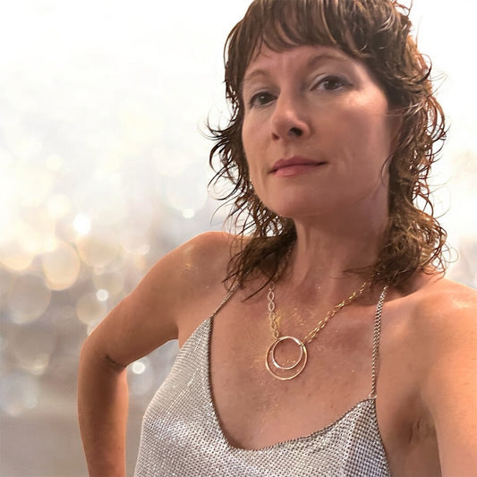 Mixed Metals statement necklace on stacey shevlin owner of madera design studio