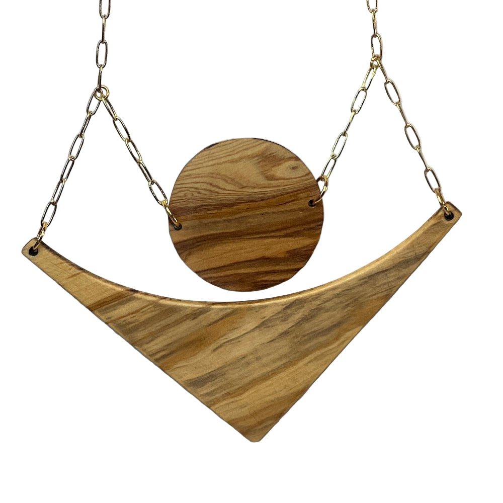 two piece necklace with a circle and triangle shaped olive wood on a gold paper clip chain.