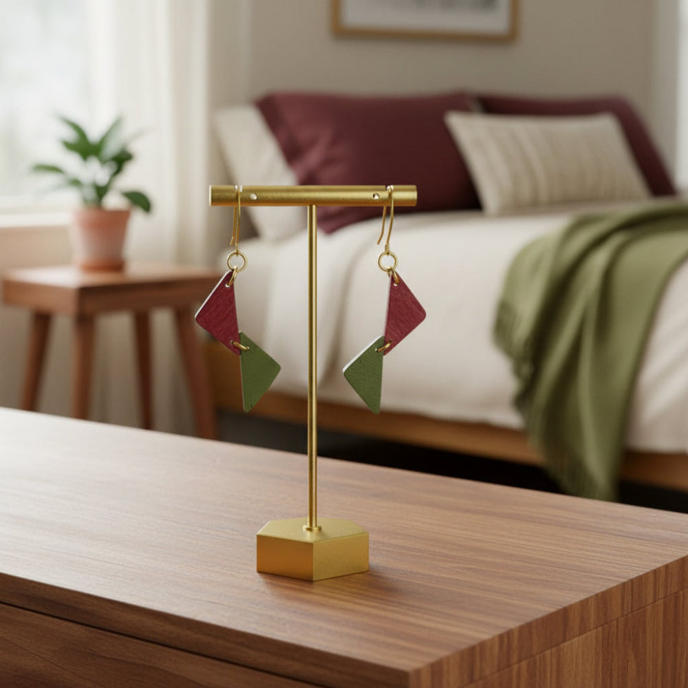 Handpainted earrings. Two opposite triangles painted pink and green hand fro a dangle earring. 