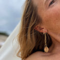 Statement Wooden Jewerly  and gold chain link earrings on a blond model by the beach - Madera Design Studio